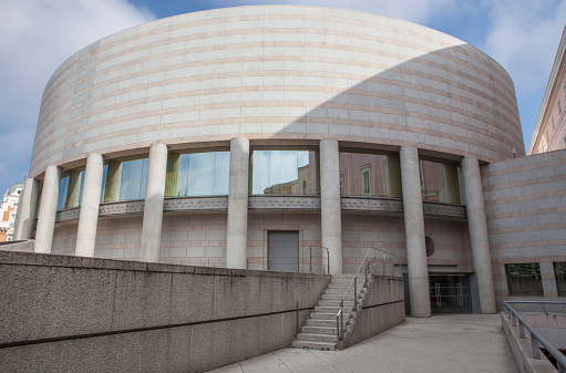 Vigo, Spain- August 7,2011: Mar de Vigo Auditorium conference center, large venue for concerts, conferences and shows that looks out over the estuary from its glass structure, designed architect César Portela. Building exterior, facade and staircase.