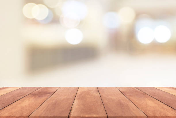 istock Blurred bokeh light background and Wooden table 652839506