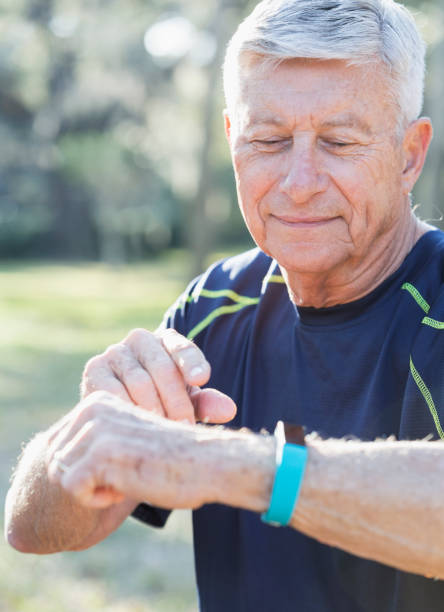 istock Senior man in his 70s using fitness tracker 652842672