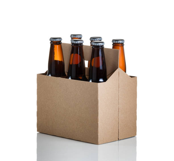 istock Six pack of glass bottled beer in generic brown  carrier 652842762