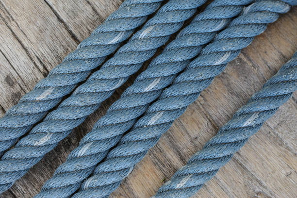 istock Blue nylon twine is old Rope on wood background 652843186
