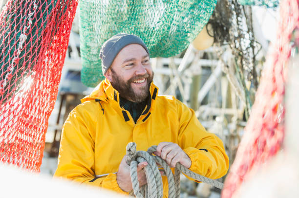 istock Man working on commercial fishing vessel 652843326