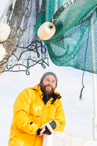 istock Man working on commercial shrimp boat 652843694
