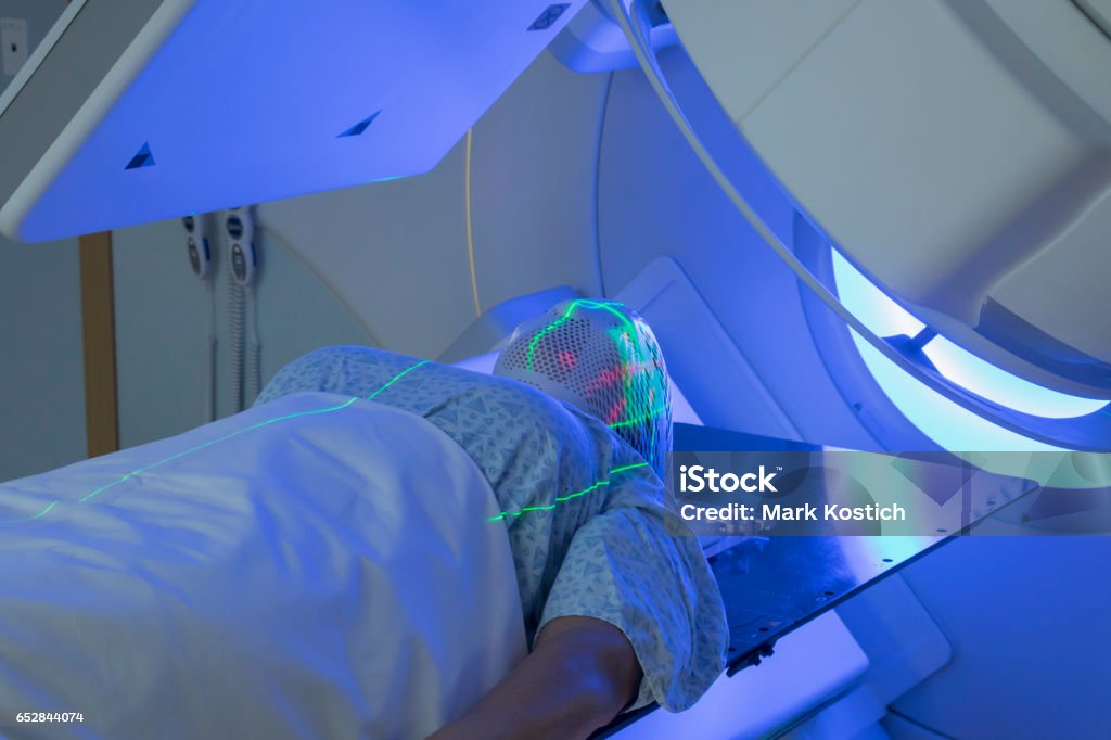 Woman Receiving Radiation Therapy/ Radiotherapy Treatments for Brain Cancer Radiotherapy Stock Photo
