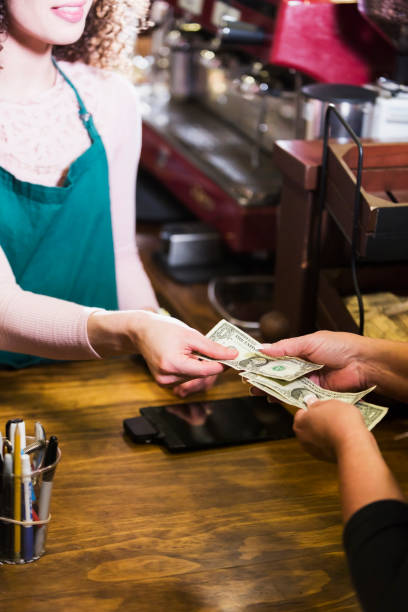 istock Customer paying cash at coffee shop 652846344