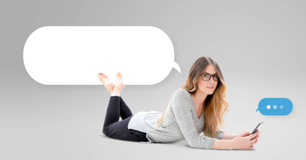 istock Woman relaxed using phone with icons 652858170