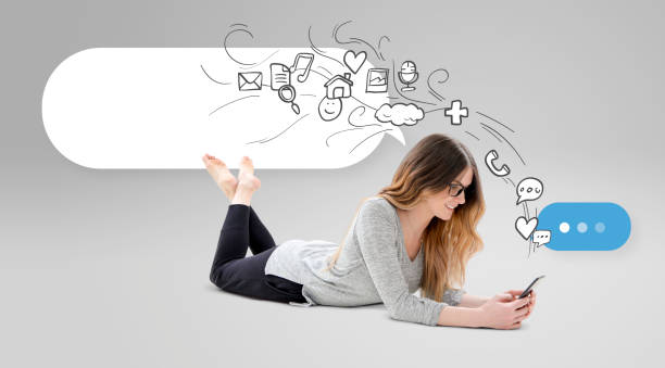 istock Woman relaxed using phone with icons 652858176