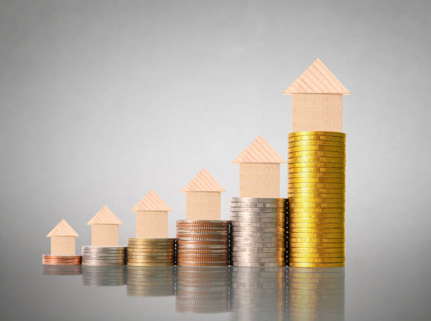 istock mortgage concept by money house from  coins 652864732