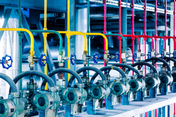 istock steel pipelines and cables in a plant 652882304