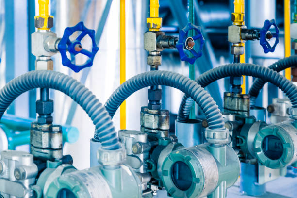 istock steel pipelines and cables in a plant 652882320