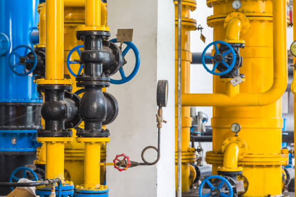 istock steel pipelines and cables in a plant 652882436