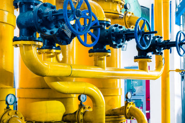 istock steel pipelines and cables in a plant 652882526