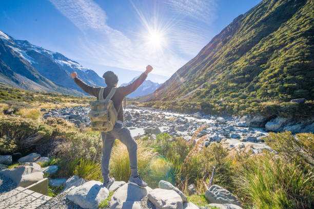 istock Young travler taking photo at mt cook mountain 652885938