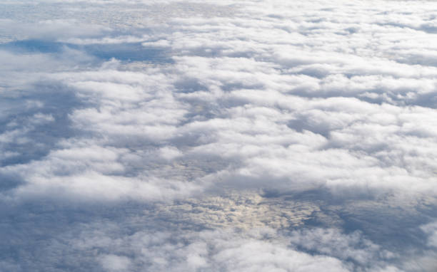 istock clouds. view from the window of an airplane flying above the clouds. 652889388