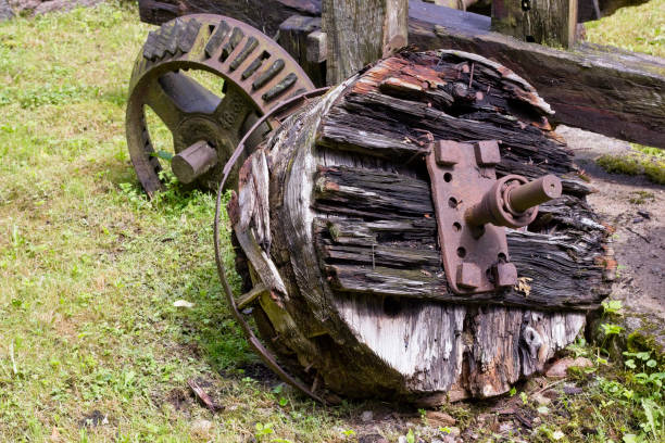 istock Old retro rotten rusty village machinery on grass 652892586