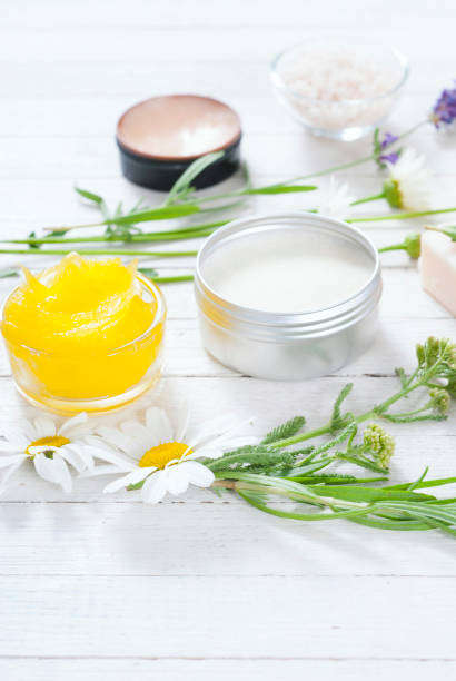 istock Body care products on white wood, top view 652915042