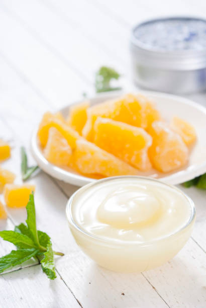 istock Body care products on white wood, top view 652917888