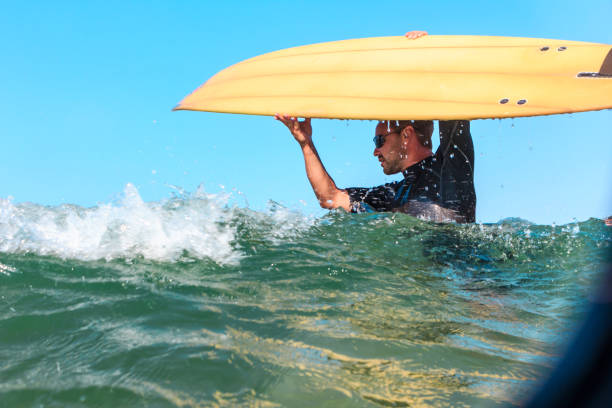 istock Close up of surfer in the sea 652929100