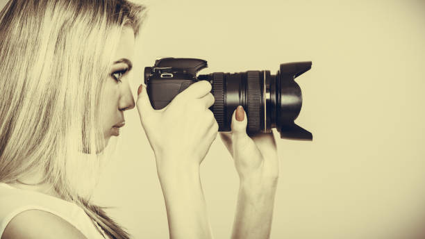 istock Photographer girl shooting images 652933048