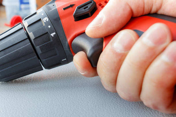 istock The screwdriver in the master's hand closeup 652943192