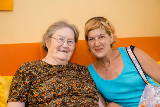 istock Daughter Visiting Her Mother In The Nursery Home 652955814