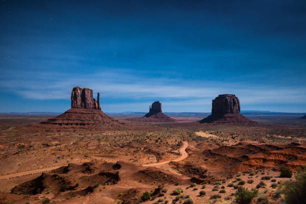 istock Monument Valley in moonlight on a starry night, Arizona, USA 652966330