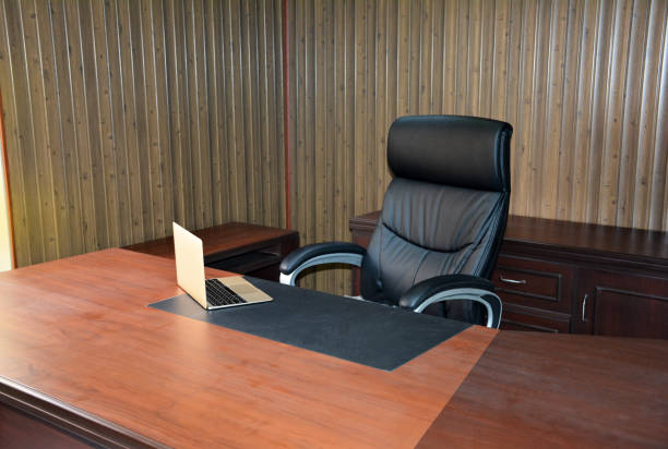 istock Office Interior Design with Laptop and Wooden Table Chair 652974242