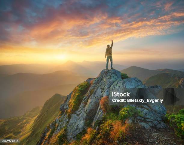 Silhouette Of A Champion On Mountain Peak Stock Photo - Download Image Now - Mountain Climbing, Mountain, One Person