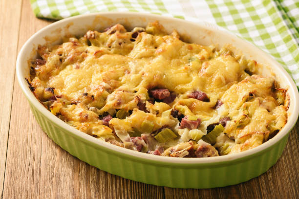 istock Casserole with bread, leek, ham and cheese. 652986048