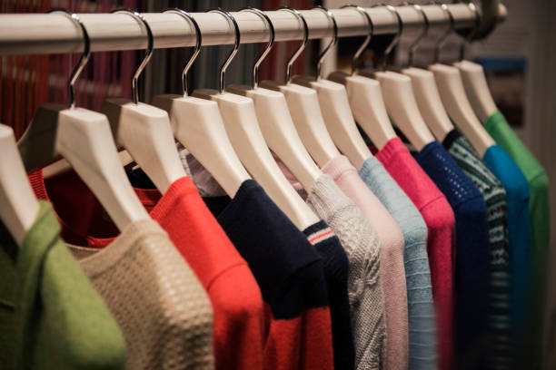 istock Color sweaters on a rack in a boutique store 652989576
