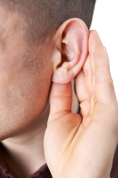istock Close Up Of Young Man Suffering With Hearing Difficulties 653004972