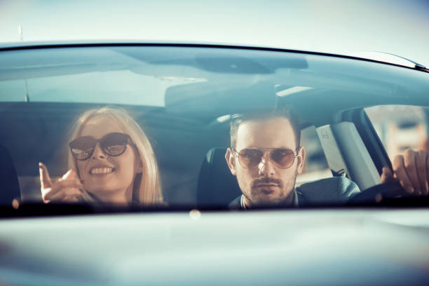 istock Couple enjoying car 653008392