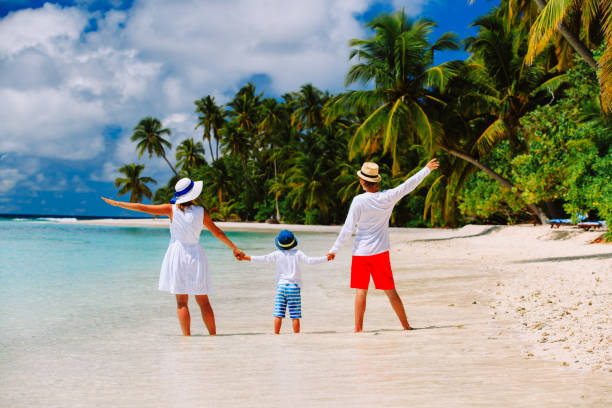 istock happy loving family with small kid on beach 653014846