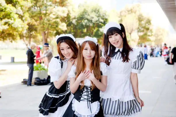 Young Japanese woman in maid cosplay