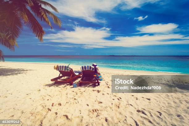 Family Chairs On The Tropical Beach Stock Photo - Download Image Now - Bag, Bahamas, Bay of Water