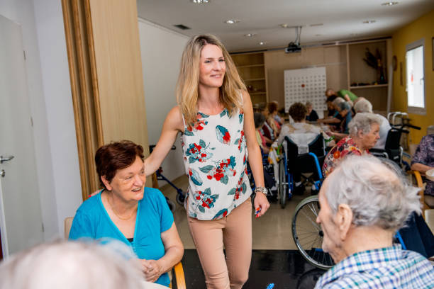istock Seniors Playing Bingo At The Retirement Home 653019594