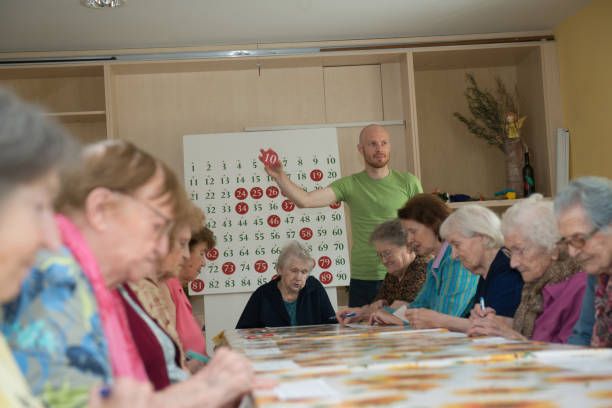 istock Seniors Playing Bingo At The Retirement Home 653019792