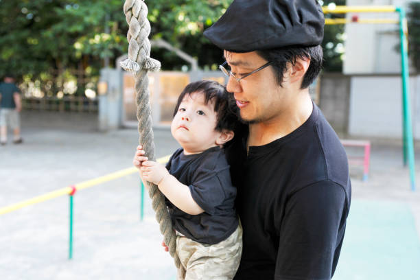 istock Toddler Park Japanese dad and man 653022156