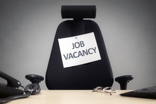 istock Office chair with job vacancy sign 653026320