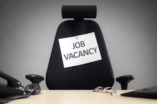 Office chair with job employee vacancy sign business concept for vacant position, employment, interview and careers