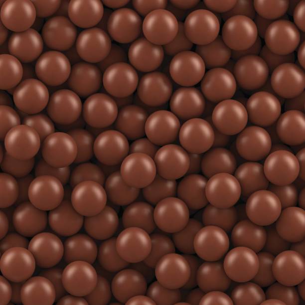 illustrazioni stock, clip art, cartoni animati e icone di tendenza di sfondo palline di cioccolato - chocolate chocolate candy backgrounds brown