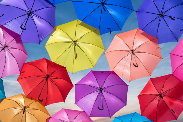 istock Colorful umbrellas in the sky 653030768