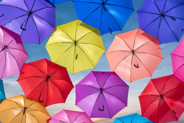 Photo of Colorful umbrellas in the sky