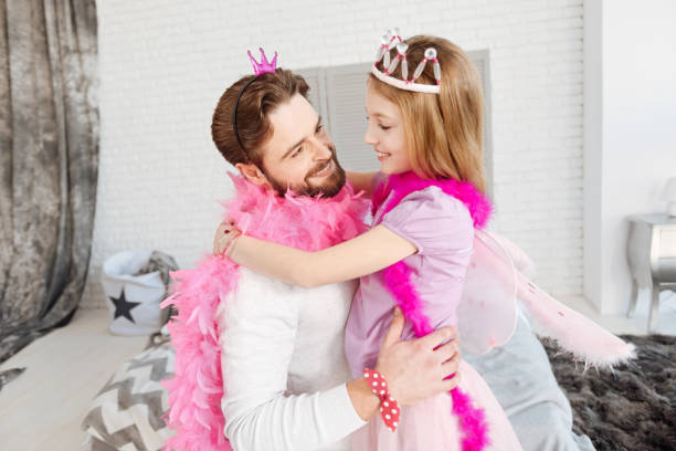 istock Happy father looking at his little daughter 653036338