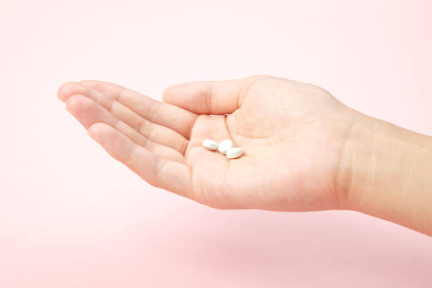 istock White tablet with the Palm of your hand 653037218