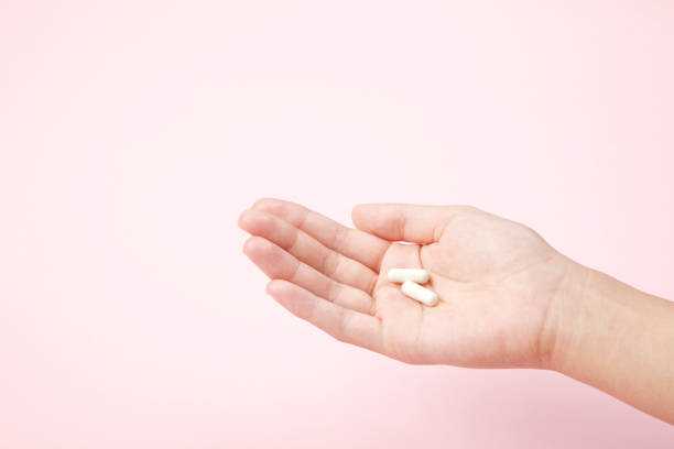 istock White tablet with the Palm of your hand 653037232