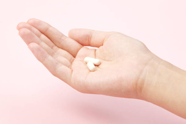 istock White tablet with the Palm of your hand 653039576
