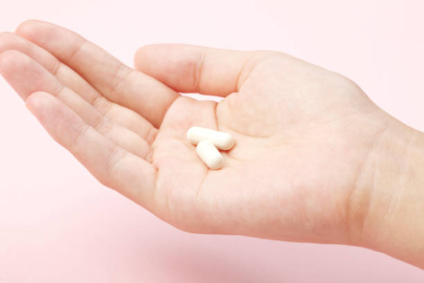 istock White tablet with the Palm of your hand 653039580