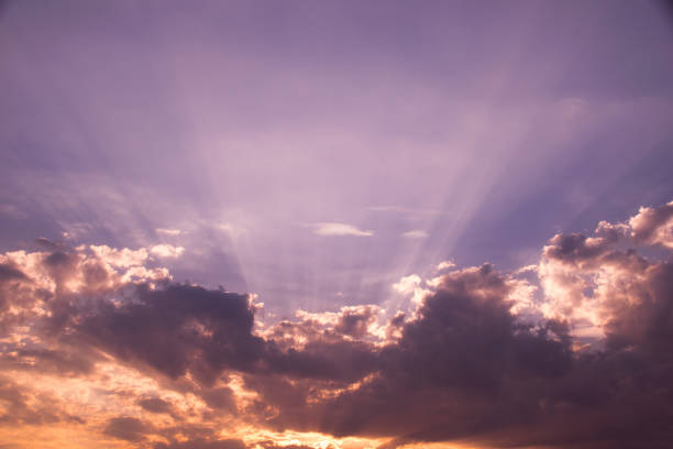 istock Sun shines and cloud  on purple sky 653039754
