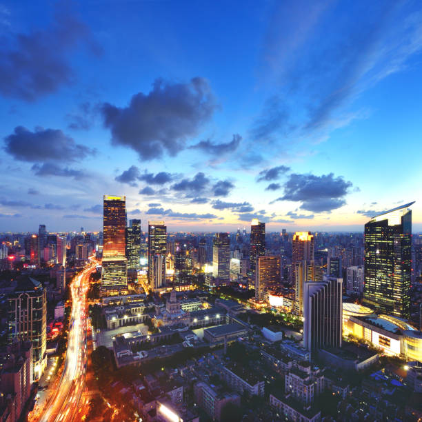 Shanghai cityscape and CBD building in dramatic sky at sunset, Shanghai, China.